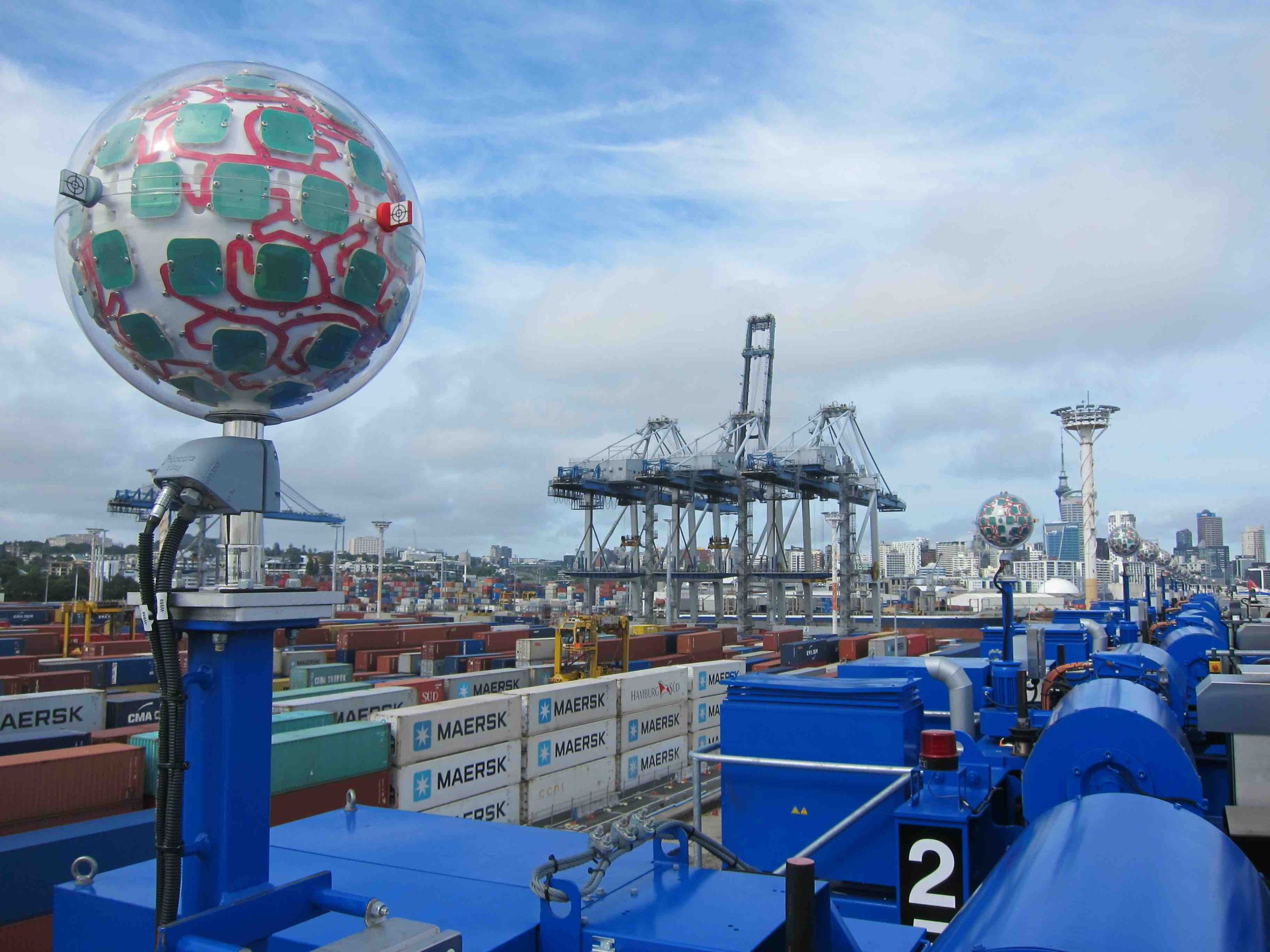 A row of Locata VRay Orb 60 antennas on Kone Straddles-in container port development-2020