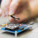 qlx3gx-chip-help-with-forceps-zoomed-out_0