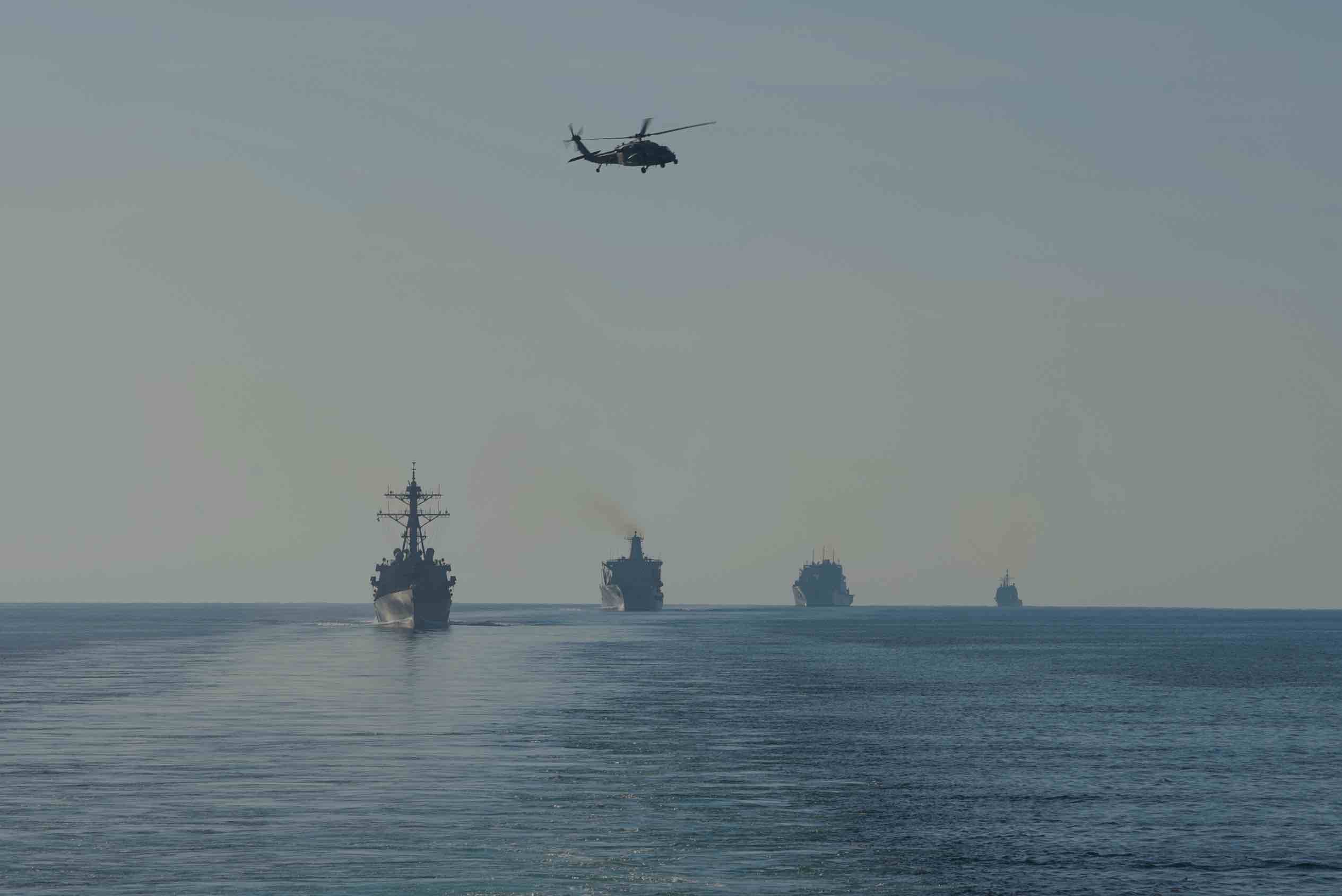U.S. Navy ships transit the Strait of Hormuz