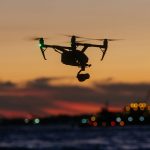 hon-aero-drone-sunset-over-water-1664x1264px